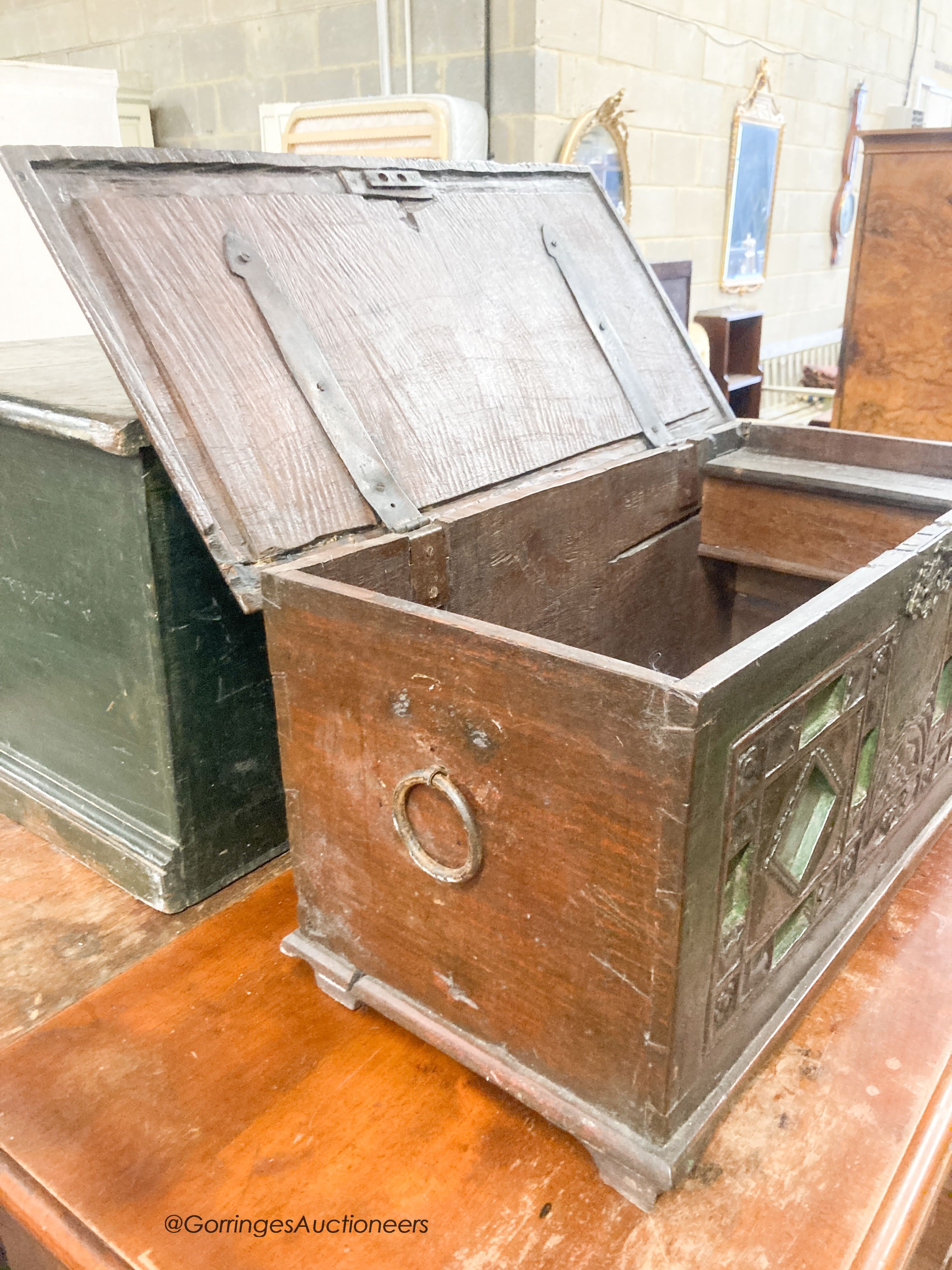 A small painted carved hardwood trunk, length 62cm, depth 30cm, height 32cm